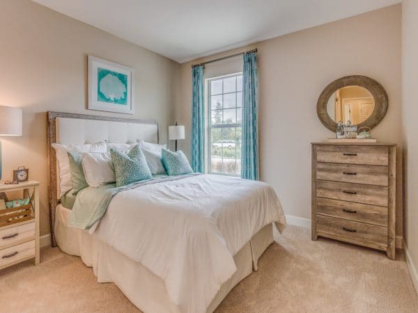 Organized bedroom with Bridget from Unclutter It