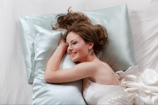Happy woman laying and smiling