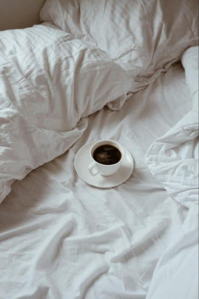 Coffee Cup On Mattress Bedroom Routine